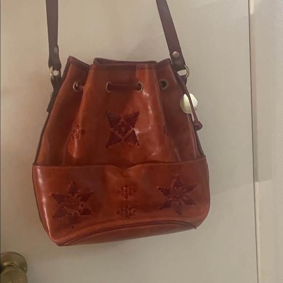 Patricia Nash Red Leather Cinch Bag with Embossed Design - Picture 10 of 12